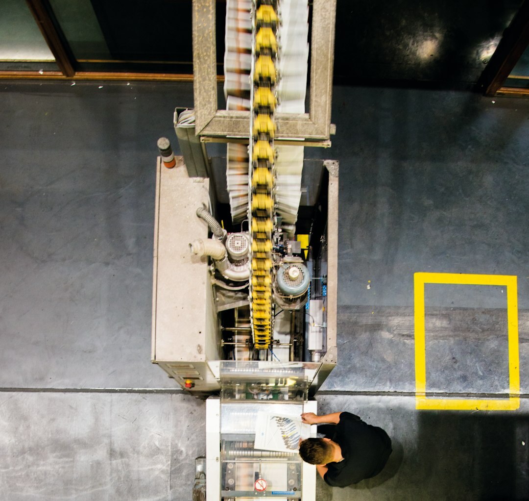 Industrial robot arm in automated manufacturing facility